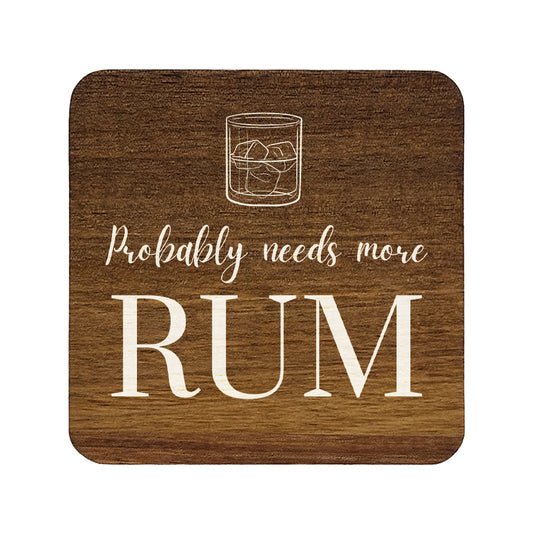 Square wooden coaster with a glass of rum and ice, and text 'Probably needs more rum' on a white background.