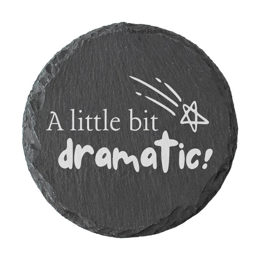Round slate coaster with 'A little bit dramatic!' text and star design on a white background