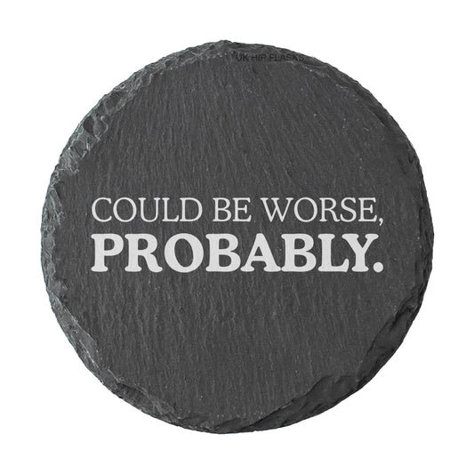 Round slate coaster with 'Could be worse, probably.' text on a white background