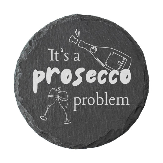 Round slate coaster with 'It's a prosecco problem' text and graphics on a white background