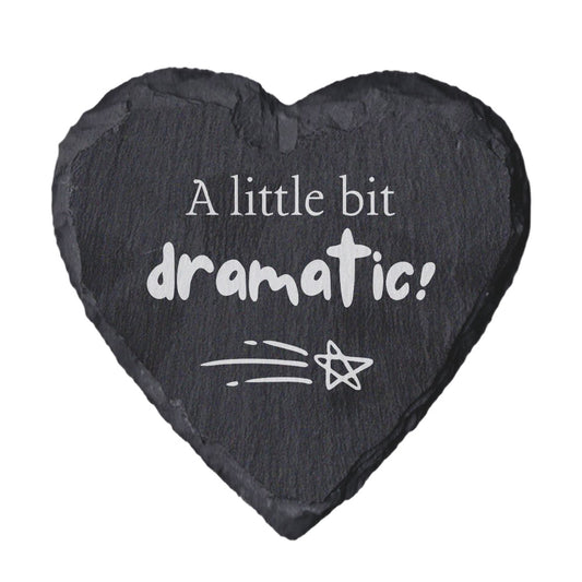 Heart-shaped slate coaster with 'A little bit dramatic!' text on a white background