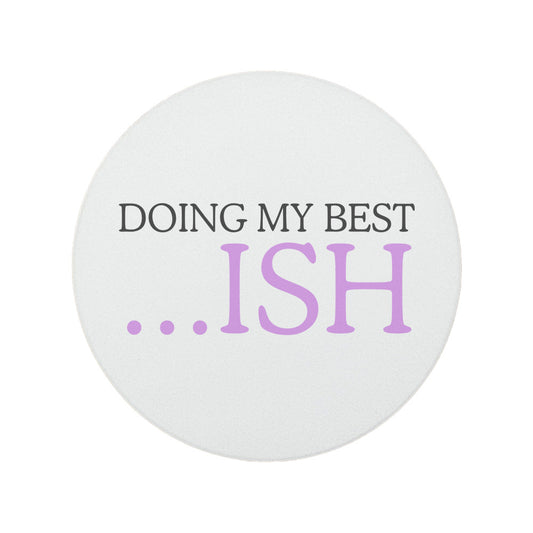 A round white ceramic coaster with the quote 'Doing my best... ISH' in grey and purple text.