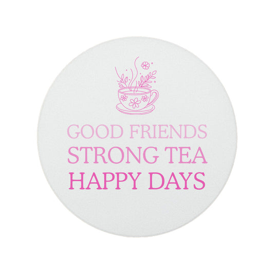 Round ceramic coaster featuring the fun quote "Good friends, strong tea, happy days" in crisp pink lettering with a teacup illustration.