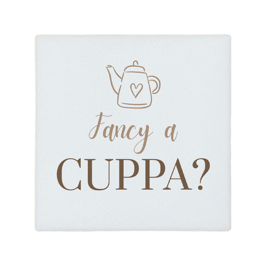Square ceramic coaster with 'Fancy a cuppa?' quote in brown text.