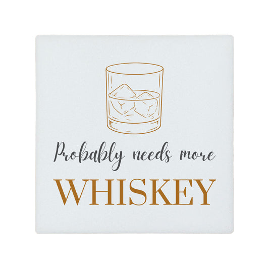 Square ceramic coaster featuring the funny quote "Probably needs more whiskey" in crisp grey and brown lettering with a whiskey glass illustration.