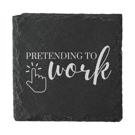 Slate coaster with 'Pretending to work' text and cursor icon on a white background
