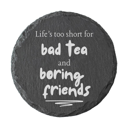 Round slate coaster with humorous quote on a white background
