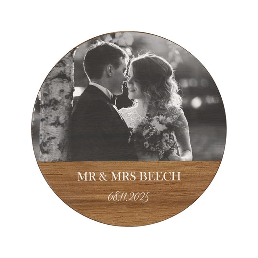 Round photo wooden coaster with a wedding photo and 'MR & MRS' name and date personalised text.