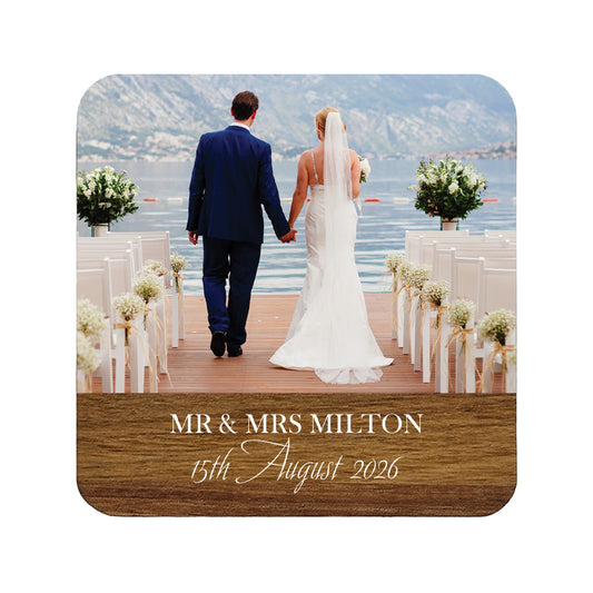 Personalised wedding photo coaster with custom name and date text.