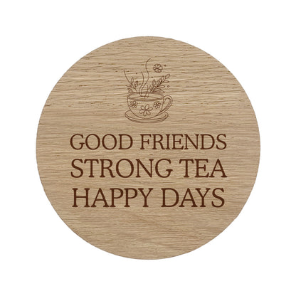 Wooden coaster with 'Good friends strong tea happy days' text 