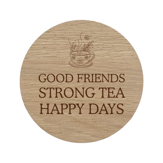 Wooden coaster with 'Good friends strong tea happy days' text 