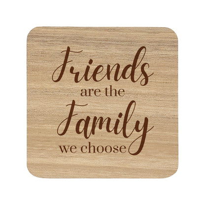 Wooden coaster with 'Friends are the family we choose' text