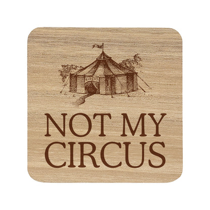 Square wooden coaster with "not my circus" text and a circus tent illustration