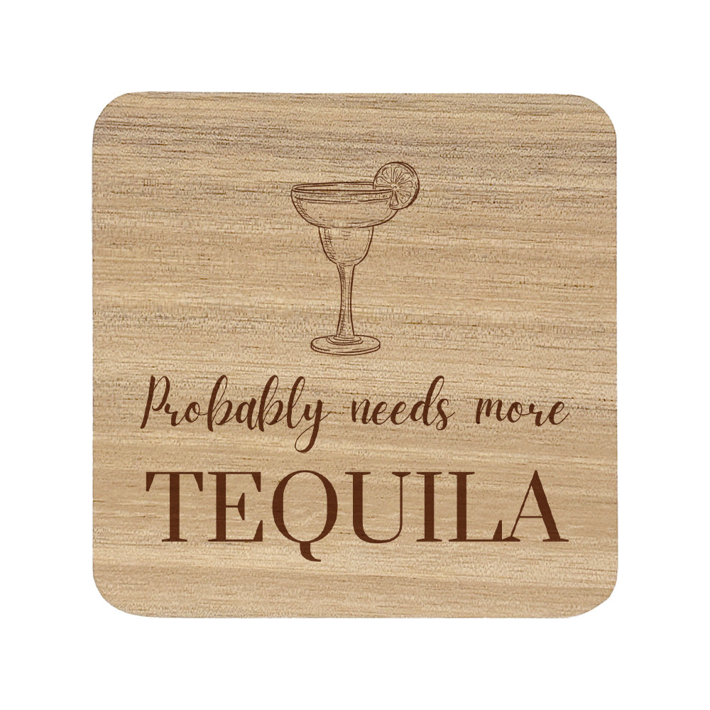 Square wooden coaster featuring the funny quote "Probably needs more tequila" in crisp lettering with a tequila cocktail illustration.