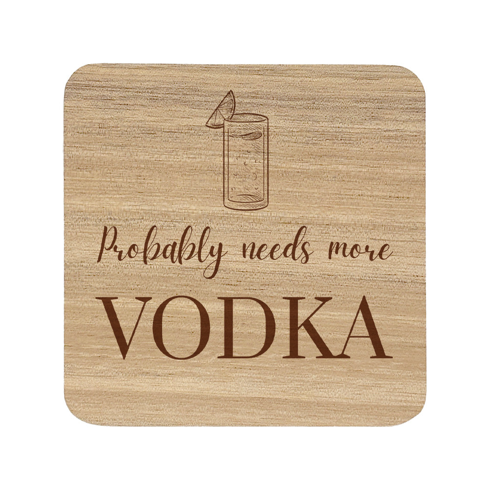 Square wooden coaster with 'Probably needs more VODKA' text and vodka tonic illustration.