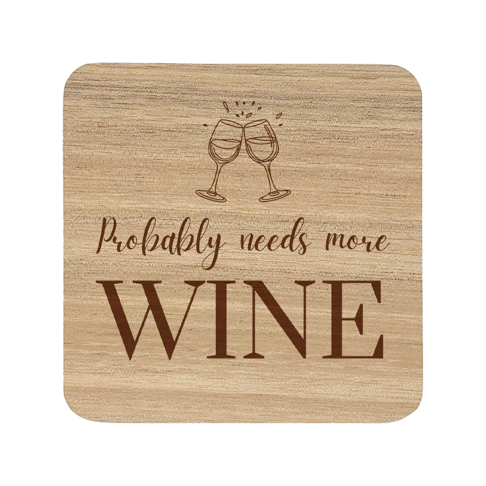 Square wooden coaster with 'Probably needs more wine' text and wine glass illustration.