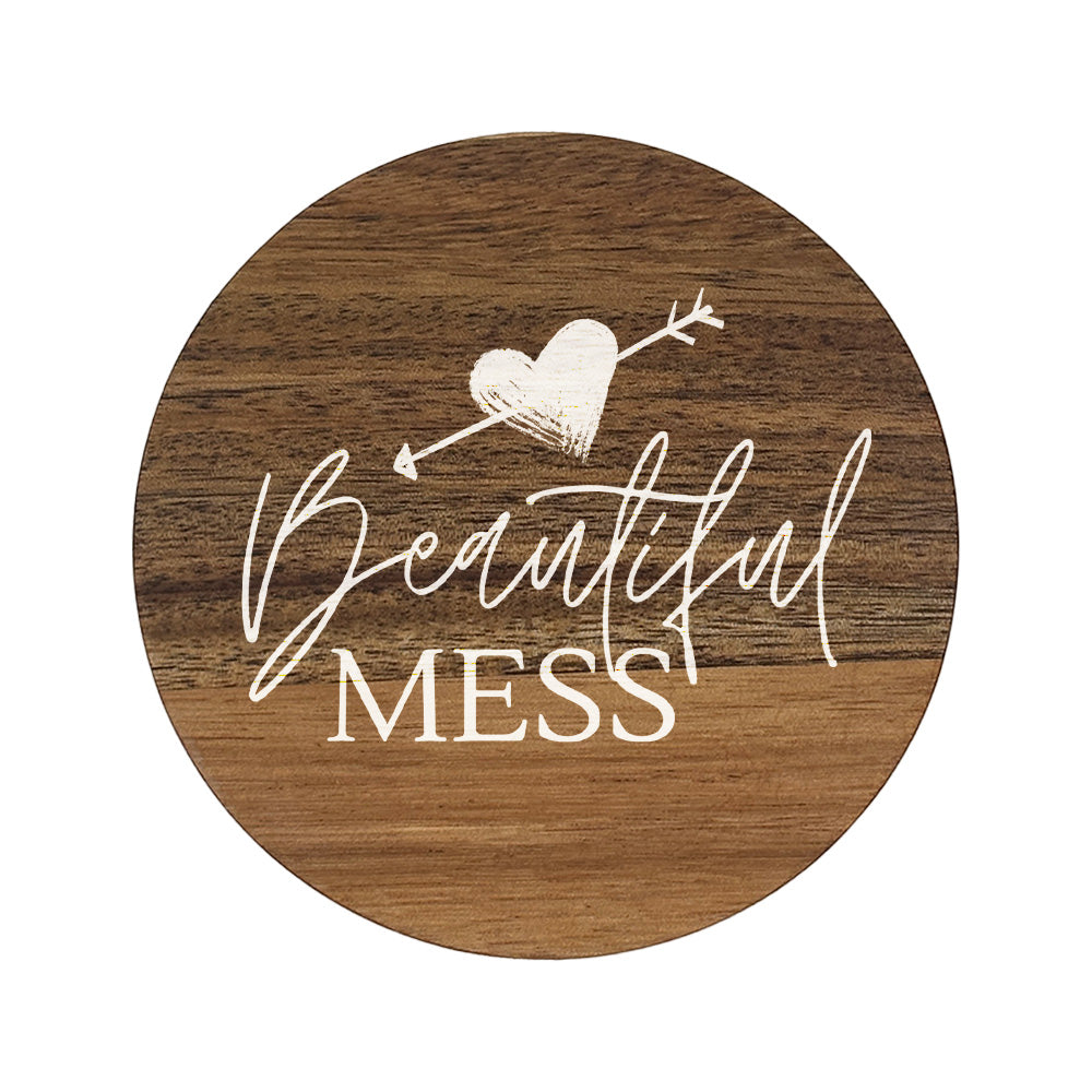 Round wooden coasters with 'Beautiful mess' text in white lettering.