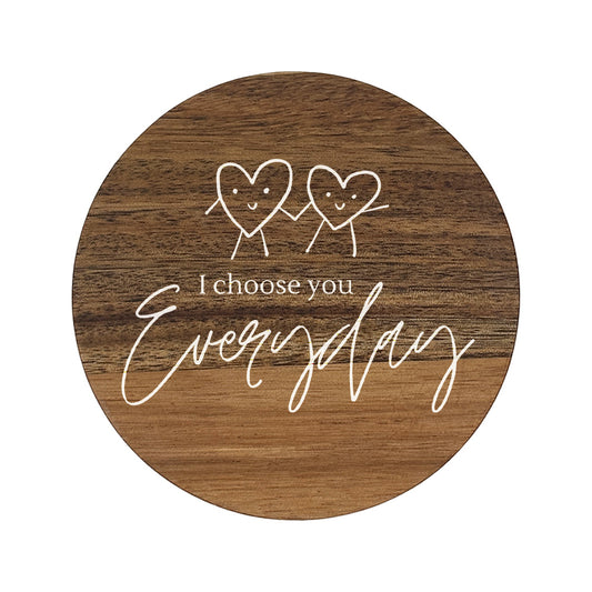 Wooden coaster with two hearts and text 'I choose you Everyday' on a white background