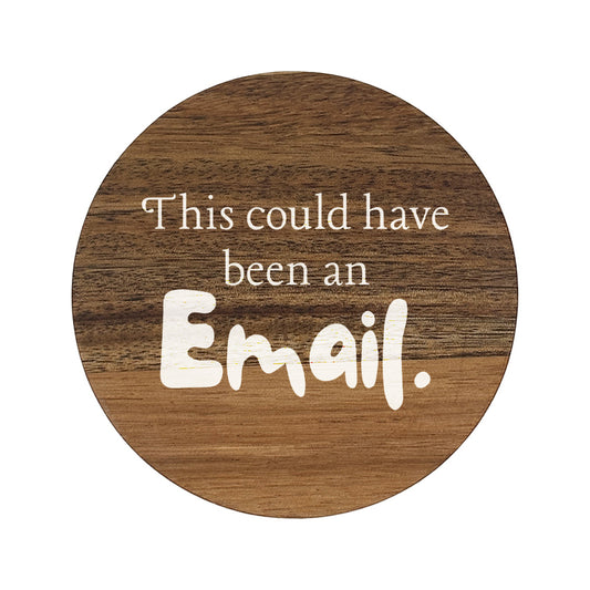 Round wooden coaster with text 'This could have been an Email.' on a white background