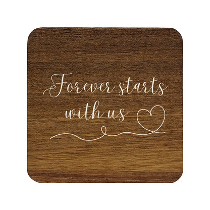 Square wooden coaster with 'forever starts with us' text and heart illustration