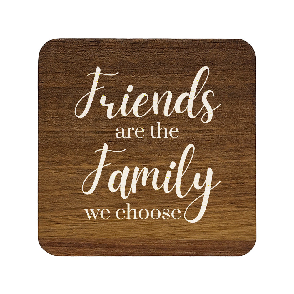 Square wooden coaster with 'Friends are the family we choose' text on a white background