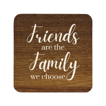 Square wooden coaster with 'Friends are the family we choose' text on a white background