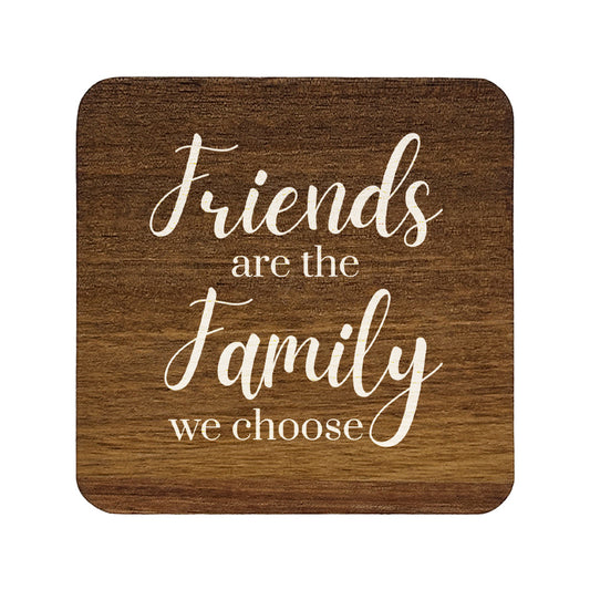 Square wooden coaster with 'Friends are the family we choose' text on a white background