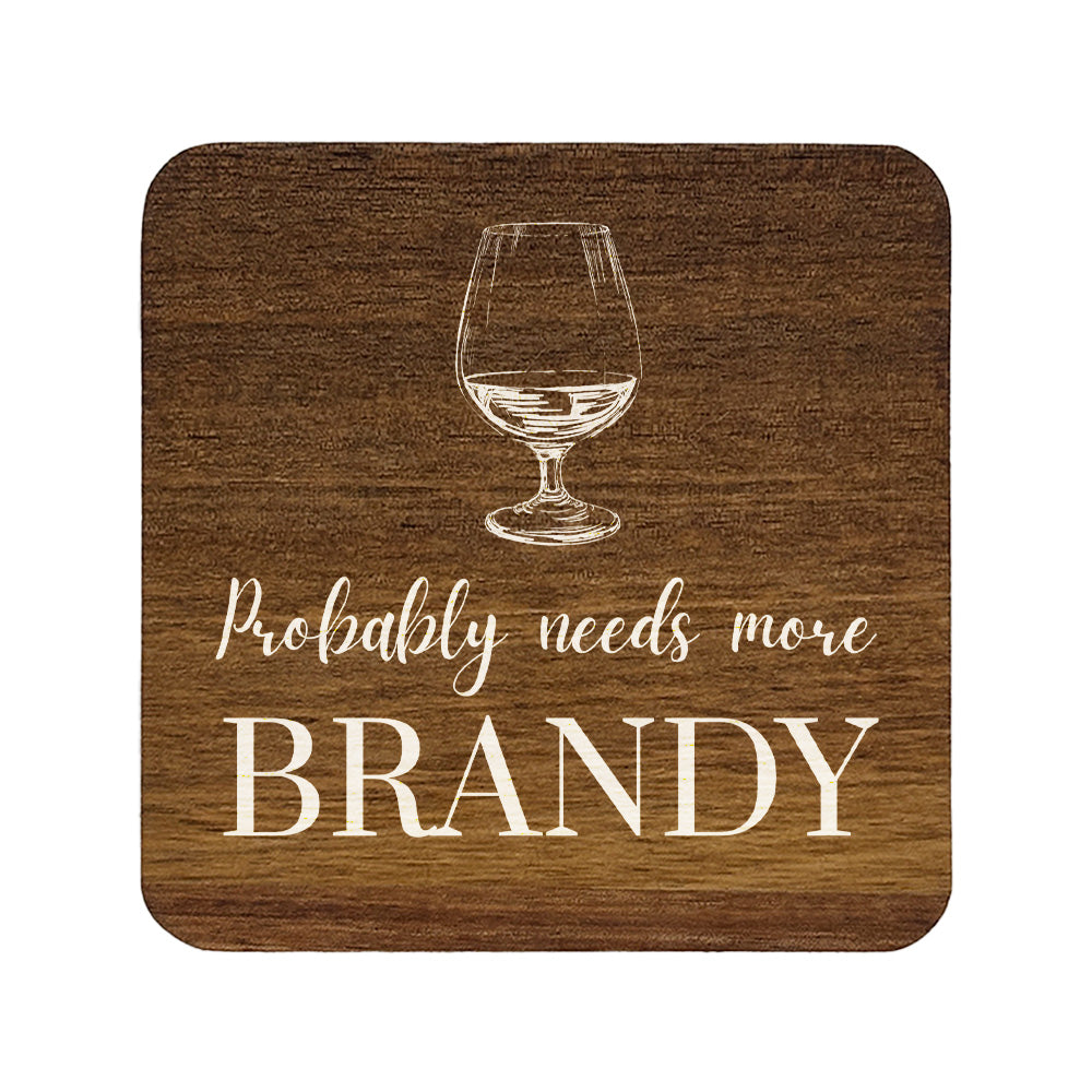 Square wooden coaster with the funny quote "Probably needs more brandy" and a brandy glass illustration.