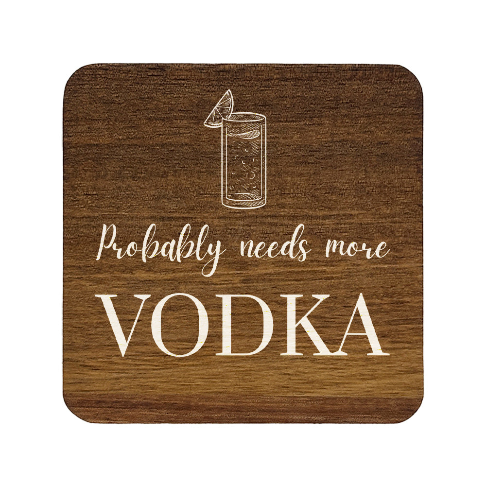 Square wooden coaster with 'probably needs more vodka' white text and vodka tonic illustration.