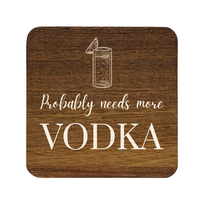 Square wooden coaster with 'probably needs more vodka' white text and vodka tonic illustration.