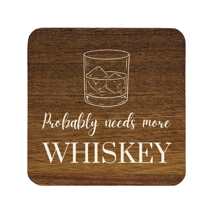 Square wooden coaster with 'probably needs more whiskey' quote and whisky glass illustration.