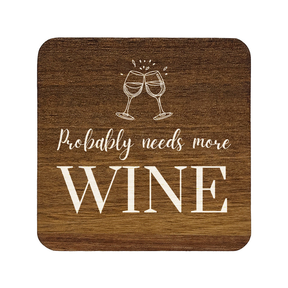 Square wooden coaster with 'probably needs more wine' quote and wine glasses illustration.
