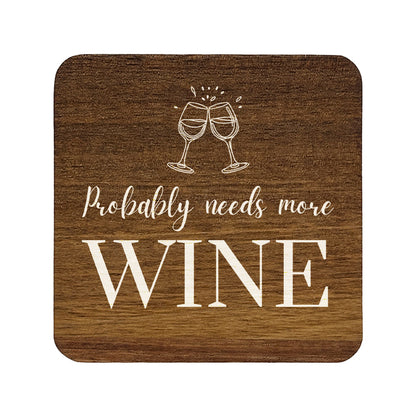 Square wooden coaster with 'probably needs more wine' quote and wine glasses illustration.