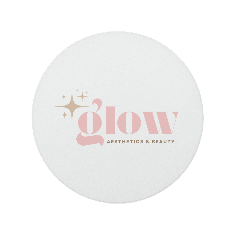 A round ceramic coaster personalised with a beauty salon and aesthetics clinic logo. Your logo here.