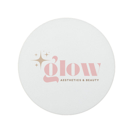 A round ceramic coaster personalised with a beauty salon and aesthetics clinic logo. Your logo here.