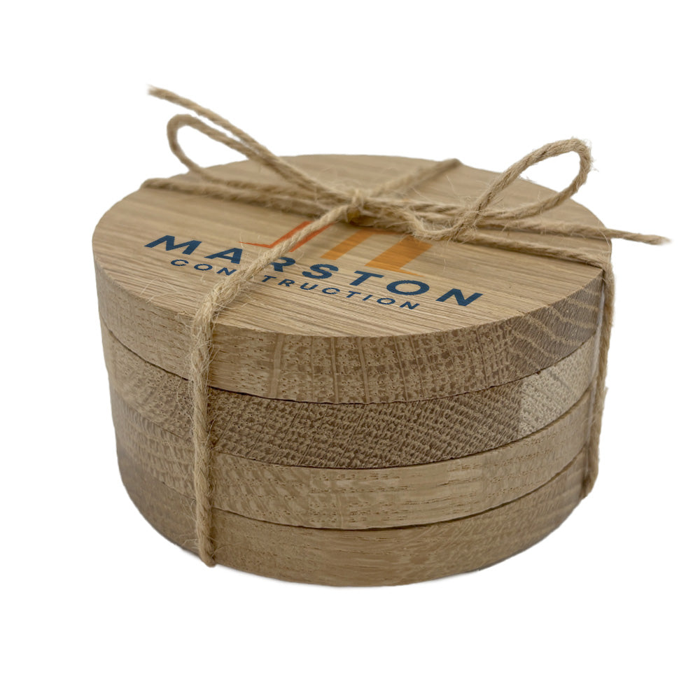 Set of 4 round wooden coasters personalised with a business logo in colour. Your logo here.