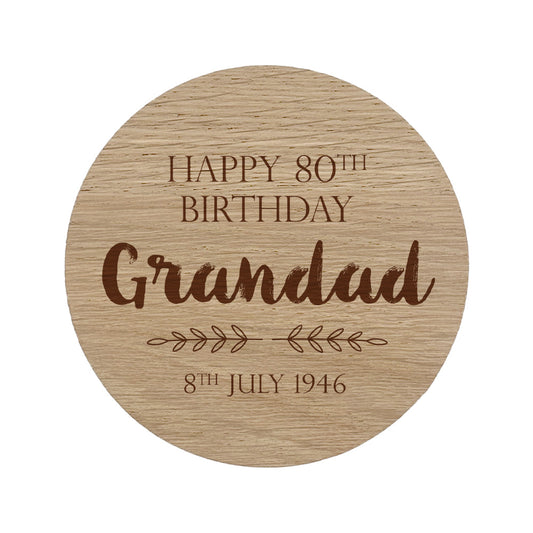 Round wooden personalised coaster with birthday message for Grandad on a white background