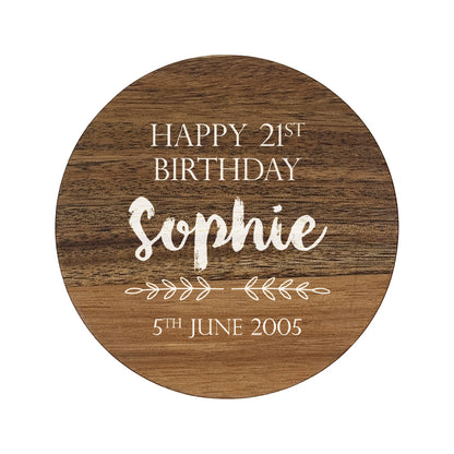Personalised round wooden coaster with 'Happy 21st Birthday Sophie' text on a white background