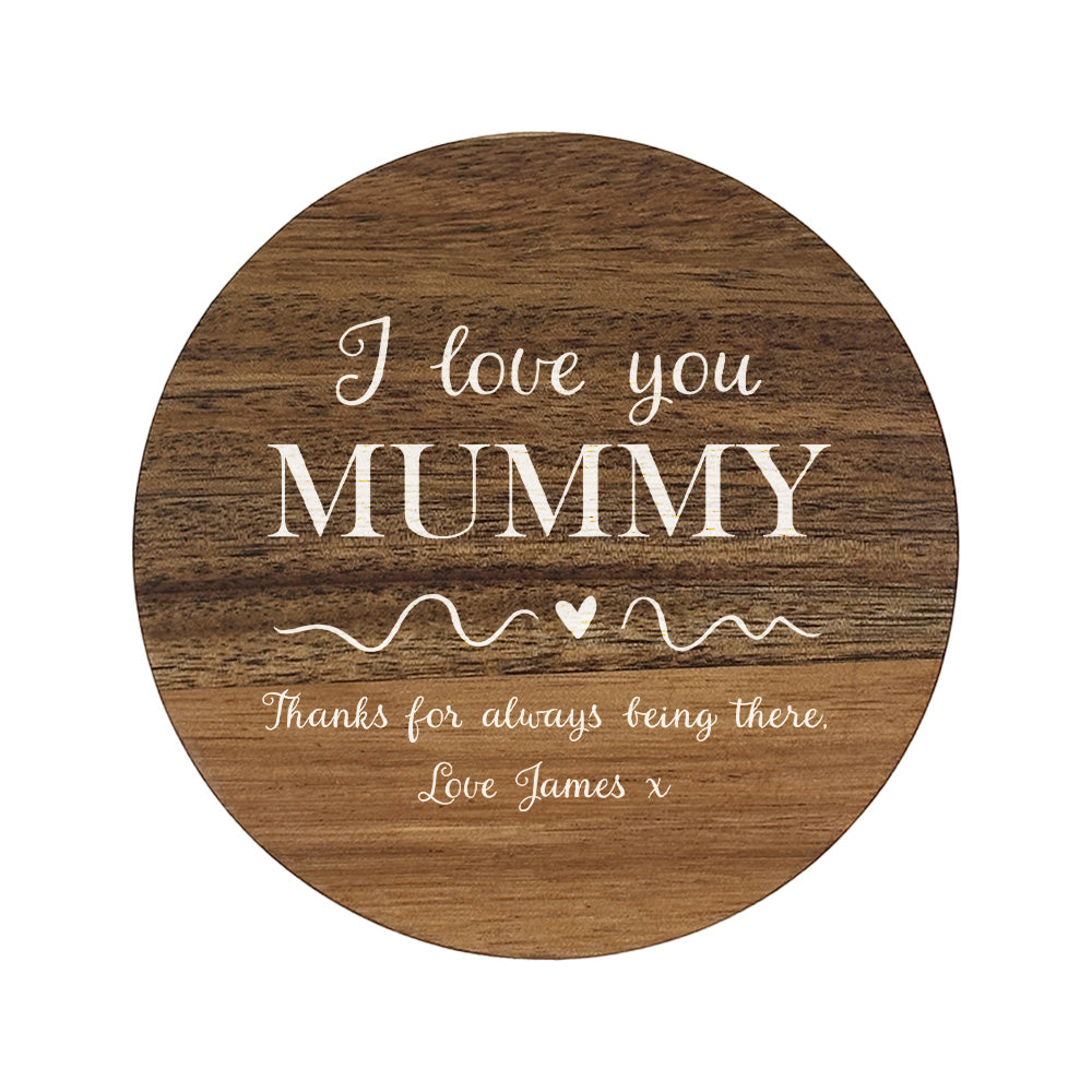 Wooden round coaster with personalised message 'I love you MUMMY' on a white background