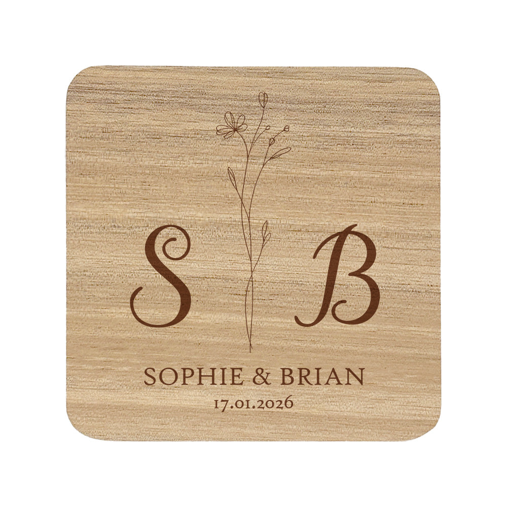 Square acacia wood coaster with personalised initials, names and date, and a floral motif.