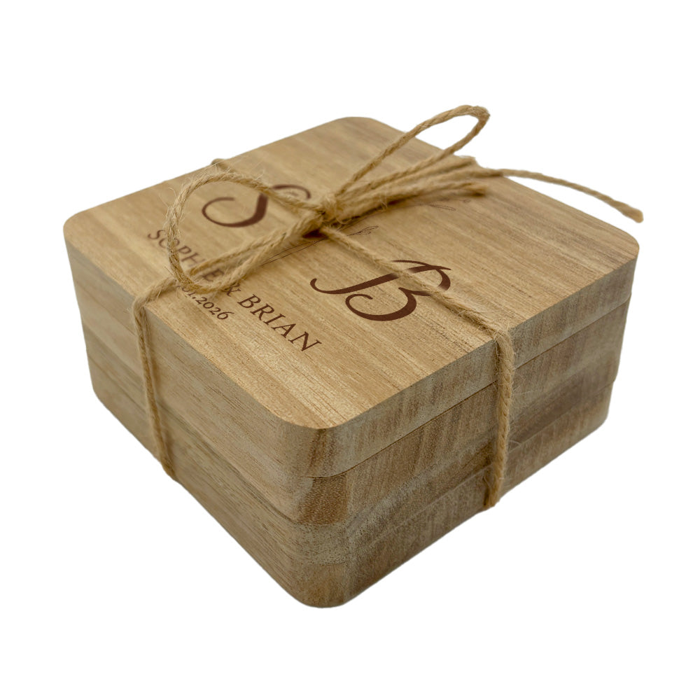 Personalised square wooden coaster set with twine bow on a white background
