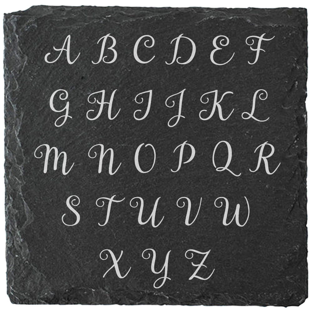 Square slate coaster showing the alphabet letter options for personalisation.