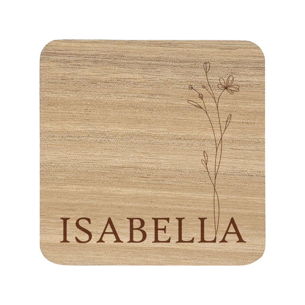 Square wooden coaster with personalised name and floral design on a white background