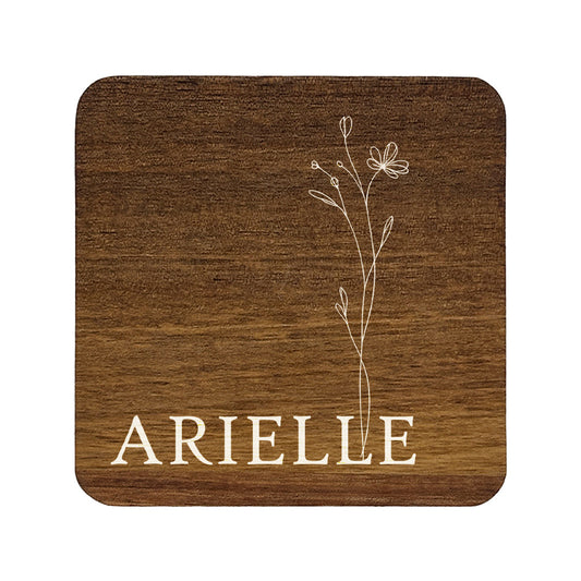 Square wooden coaster with floral design and personalised name on a white background
