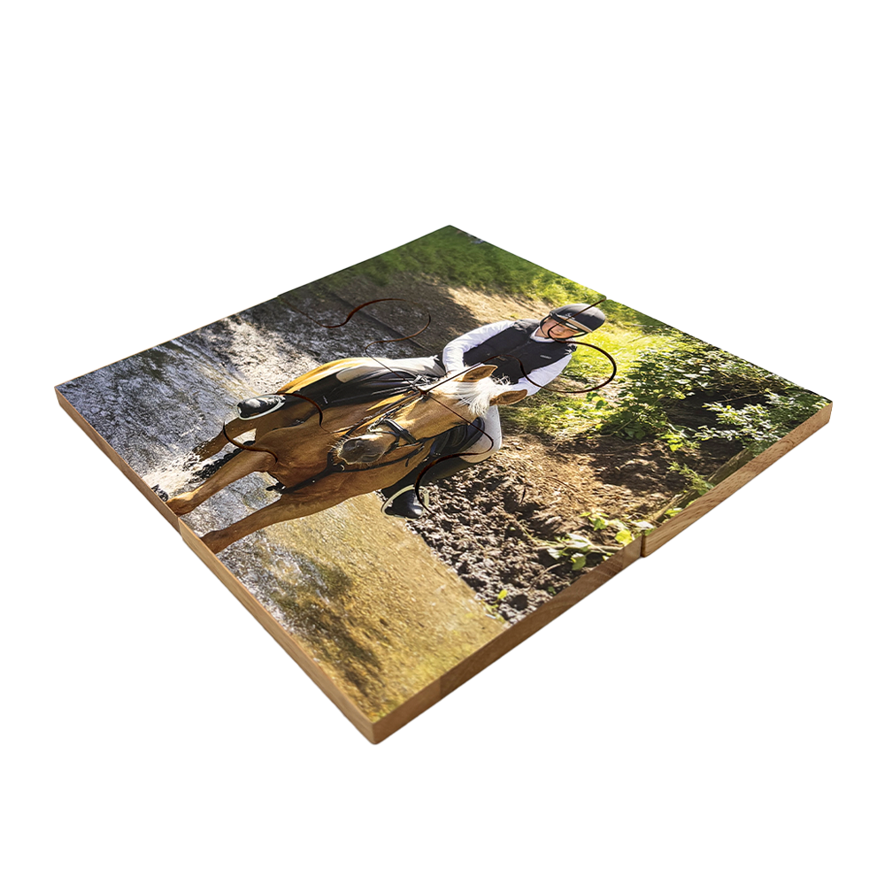 A set of 4 bamboo coasters printed with a photo. The coasters fit together as a jigsaw puzzle to complete the image.