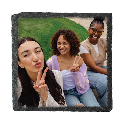 Personalised square slate photo coaster with a photo of three friends.