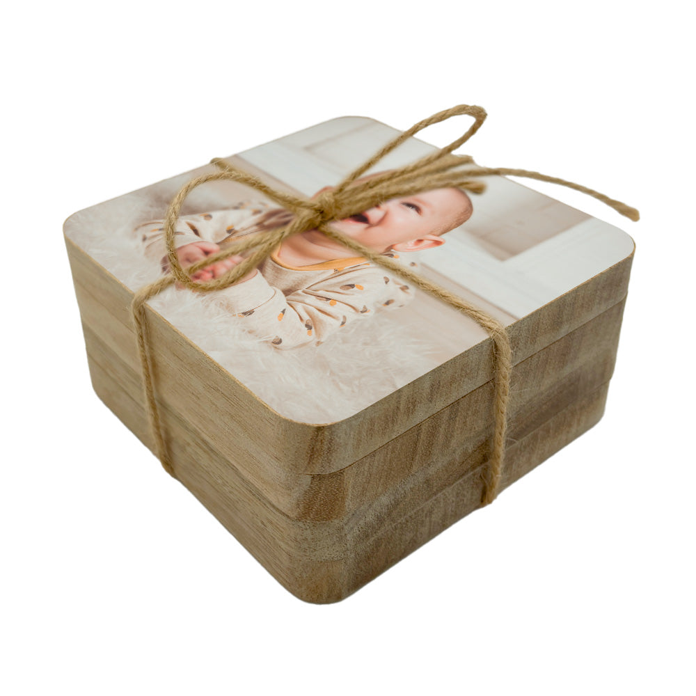 Set of 4 square wooden coasters personalised with a photo of a baby clapping.