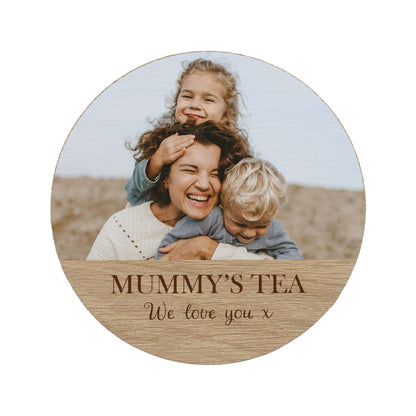 Round wooden coaster with a photo of a woman and two children, and 'Mummy's Tea' personalised text.