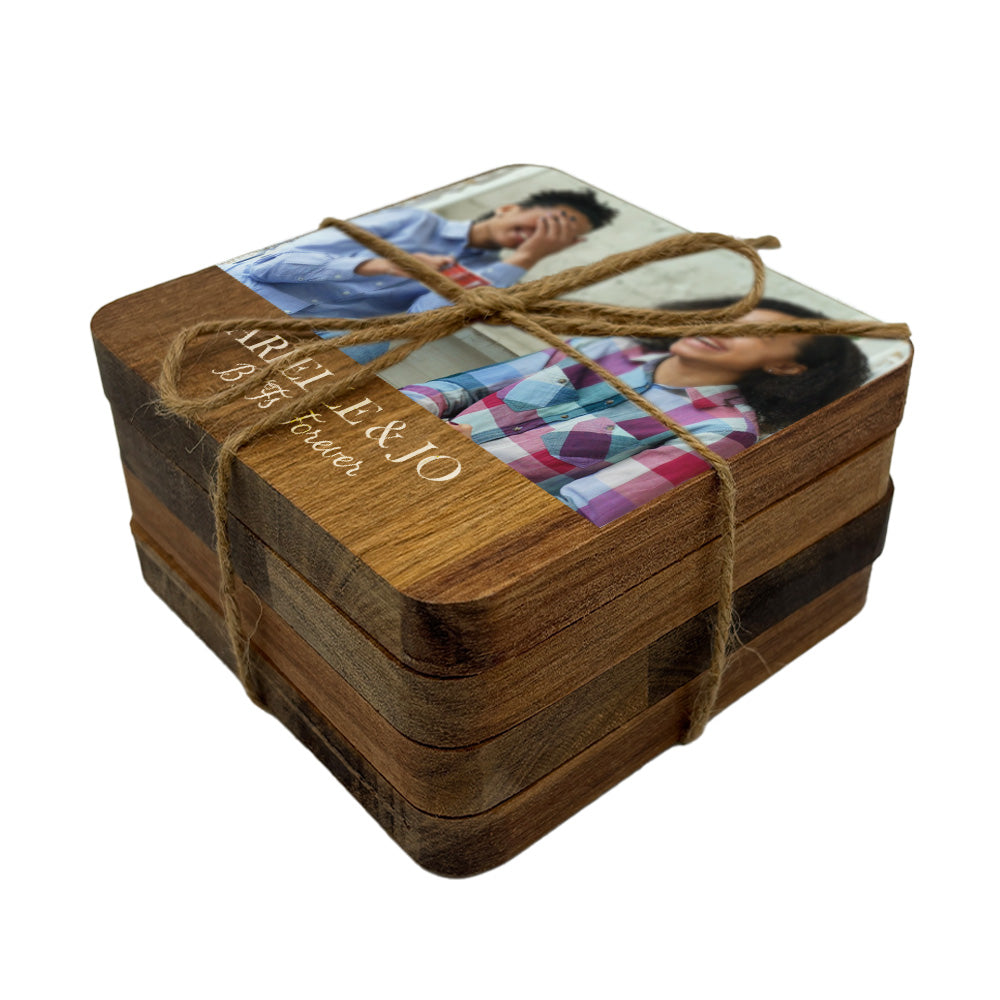 Set of wooden coasters with personalised photo and text on a white background