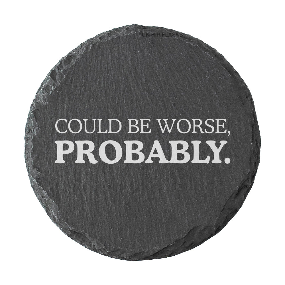 Round slate coaster with 'Could be worse, probably.' text on a white background